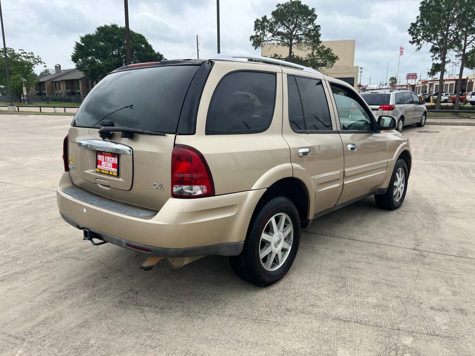 2007 GOLD /TAN Buick Rainier CXL (5GADS13S172) with an 4.2L L6 DOHC 24V engine, 4-Speed Automatic transmission, located at 14700 Tomball Parkway 249, Houston, TX, 77086, (281) 444-2200, 29.928619, -95.504074 - Photo #6